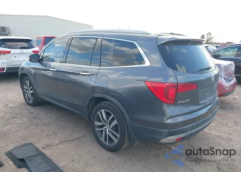 2018 Honda Pilot Touring z USA, uszkodzony, nr VIN 5FNYF5H94JB003651